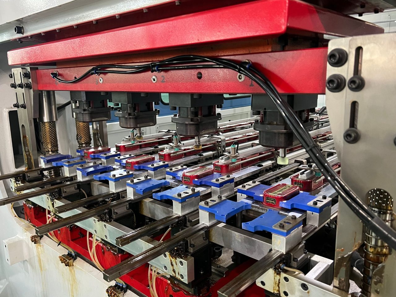 Can-forming press shaping printed sardine tins in Docanned&rsquo;s own can plant