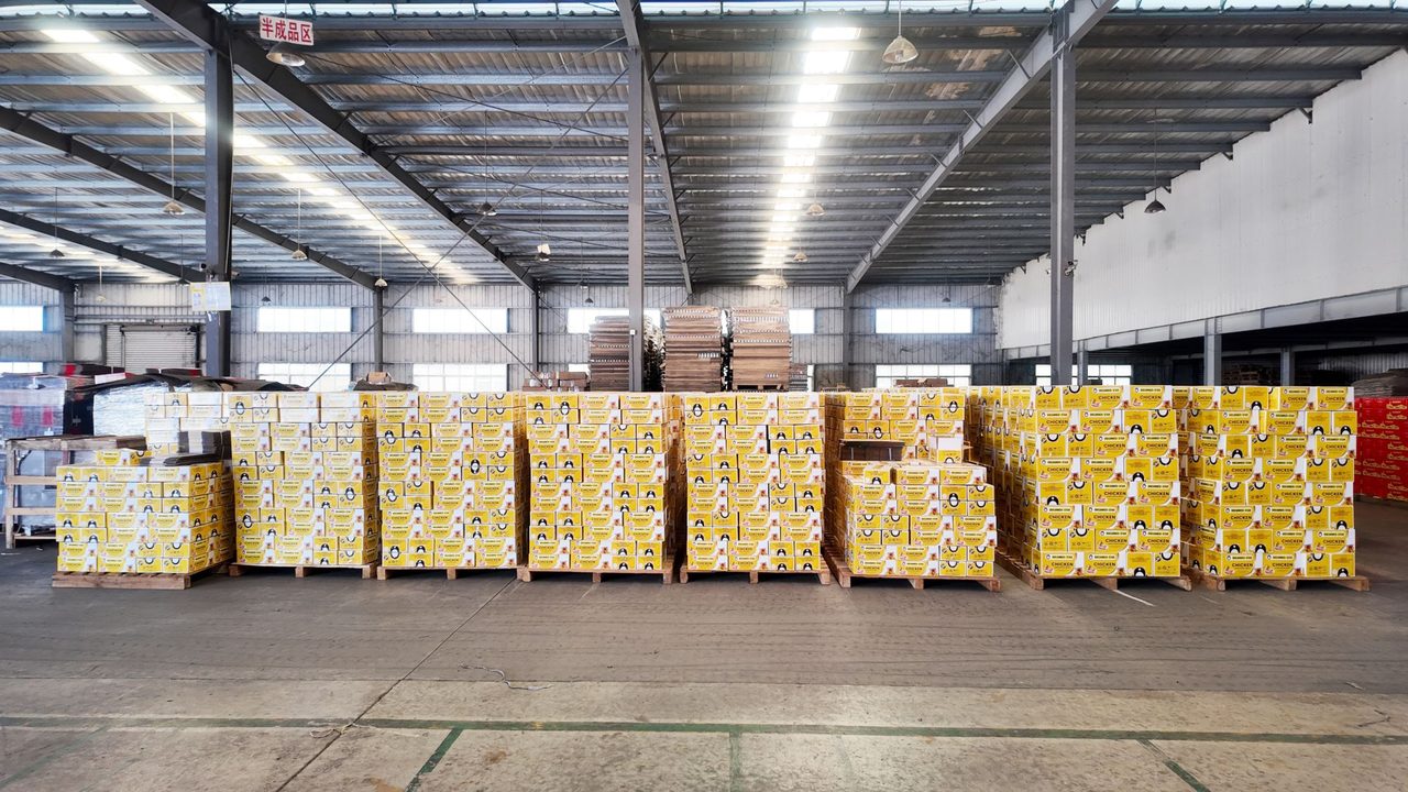 Pallets of DocannedStar chicken luncheon meat cartons in the warehouse