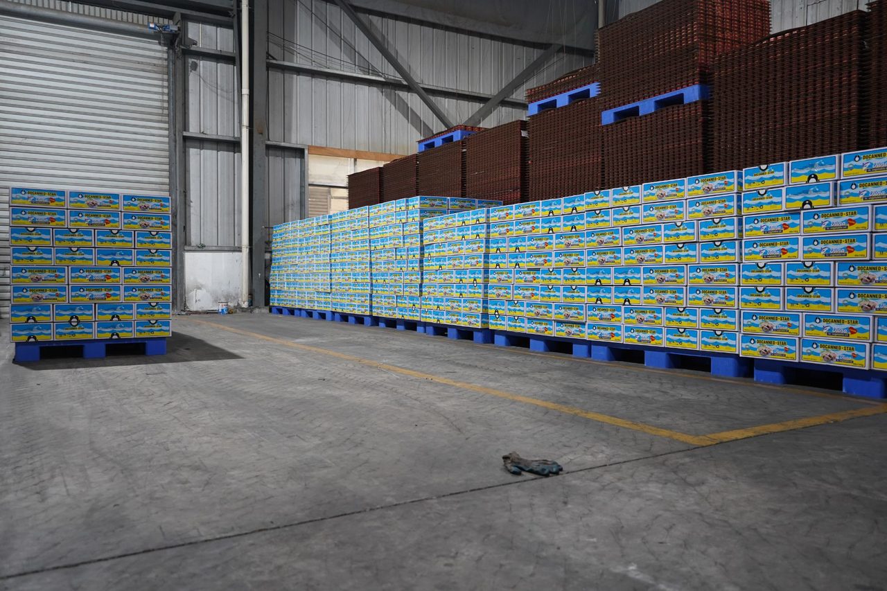 Pallets of DocannedStar tuna in vegetable oil cartons ready for loading